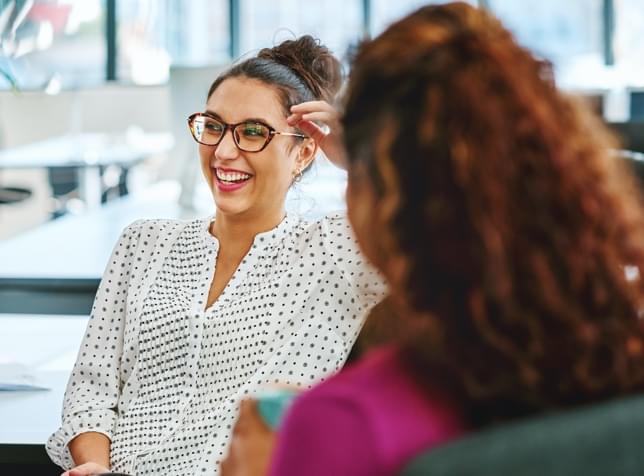 The General Car Insurance Careers - photo of a young woman interviewing for a job